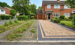garden of block paving that needs cleaning