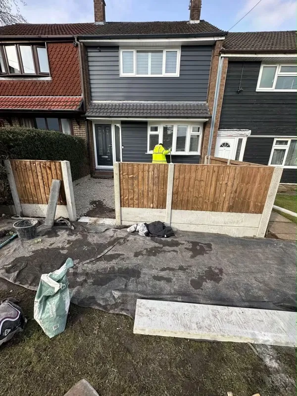 Feather-edge fencing and prepared base at the front of a Trentham home